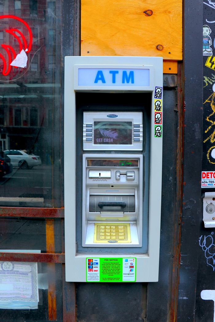 Crafting Captivating Headlines: Your awesome post title goes here Street ATM machine in an urban setting, ideal for finance and commerce themes.